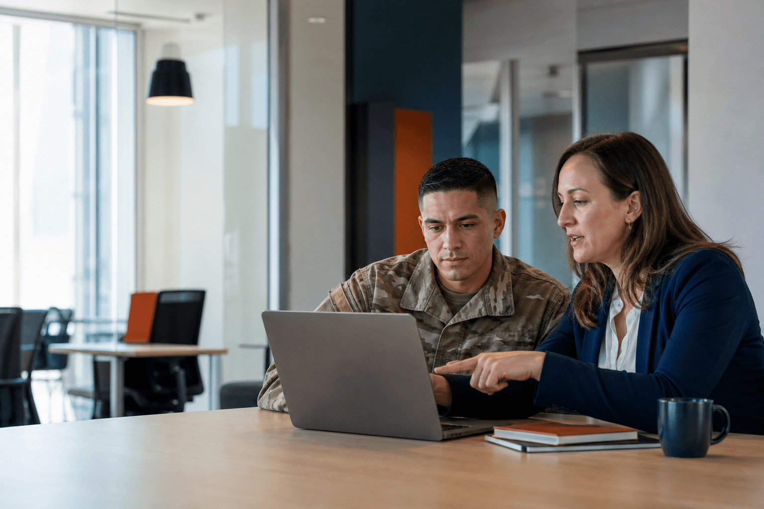 Service member reviewing professional credentialing options with a training advisor.